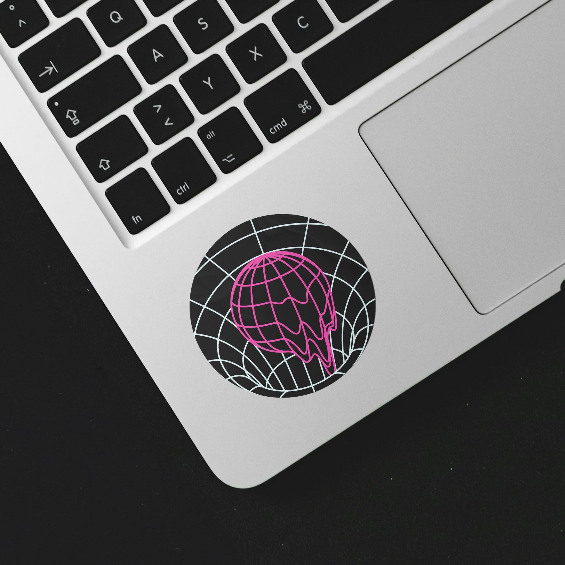 Laptop with a decorative sticker on the palm rest area