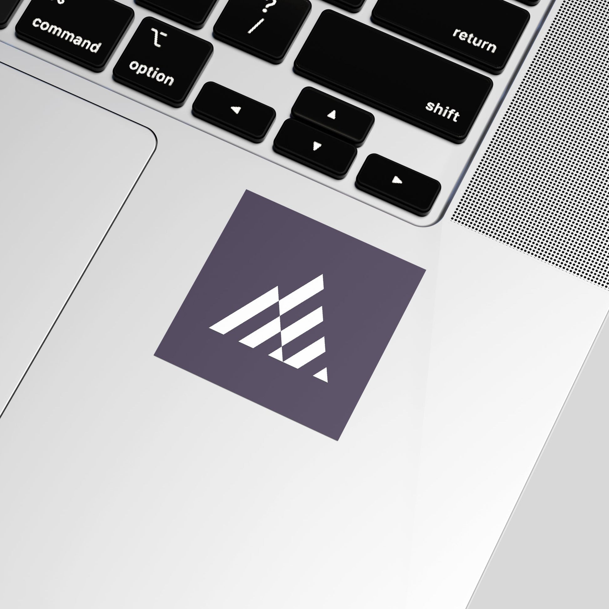 Laptop with a logo sticker on the palm rest area