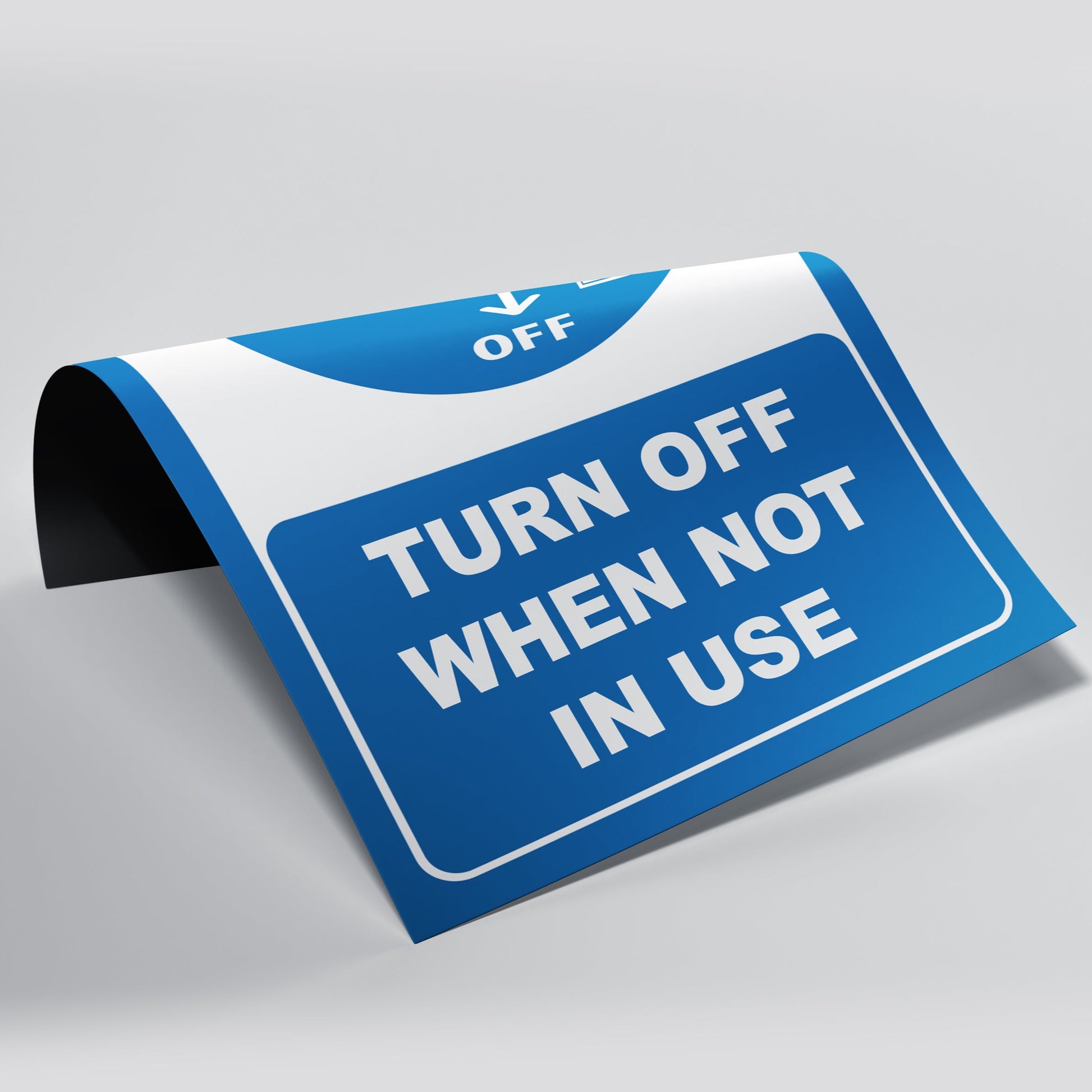 Magnetic Sign with blue design onto a white background. The sign is show so people can see both sides of the sign