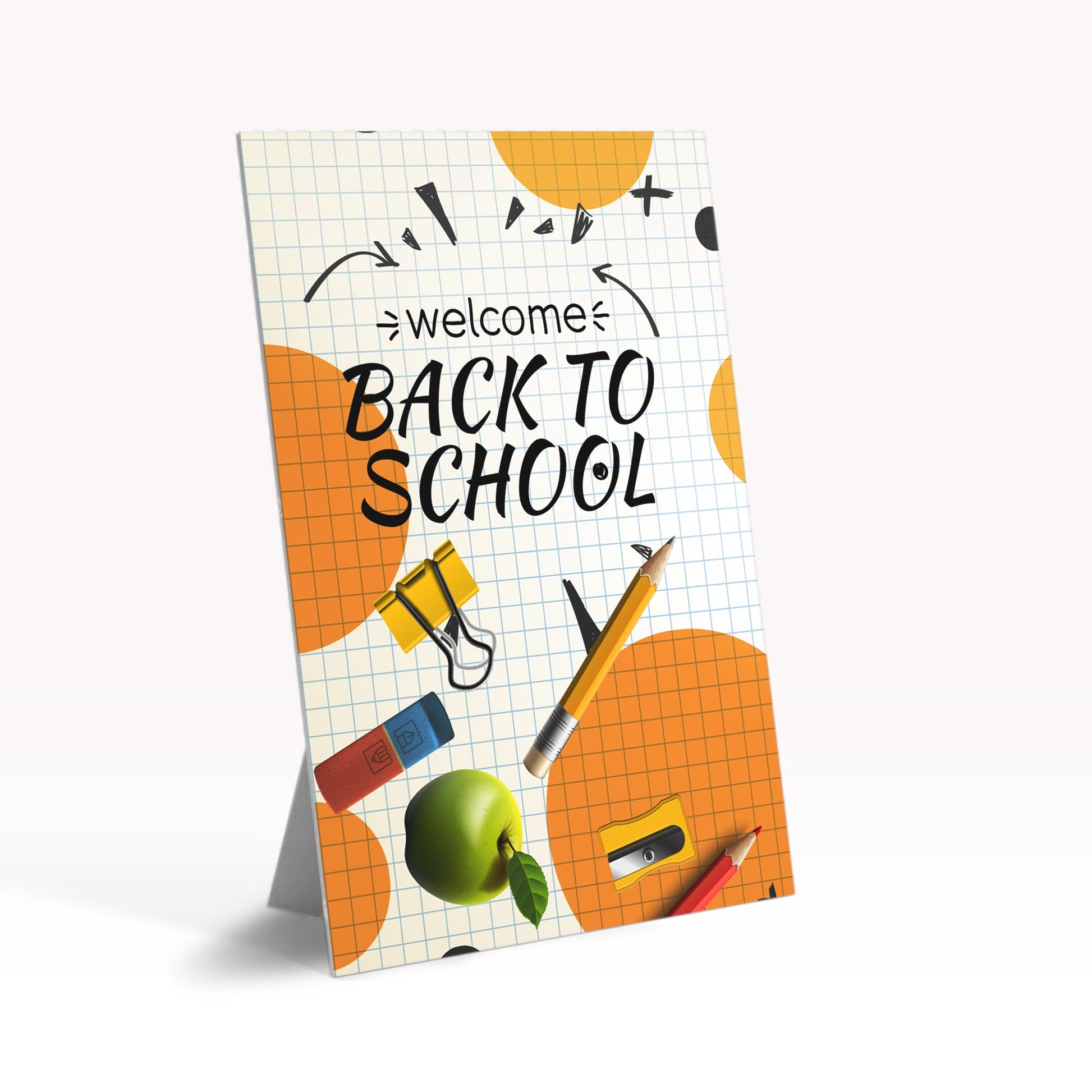 Table tent sign with 'Welcome Back to School' text and school supplies on a white background