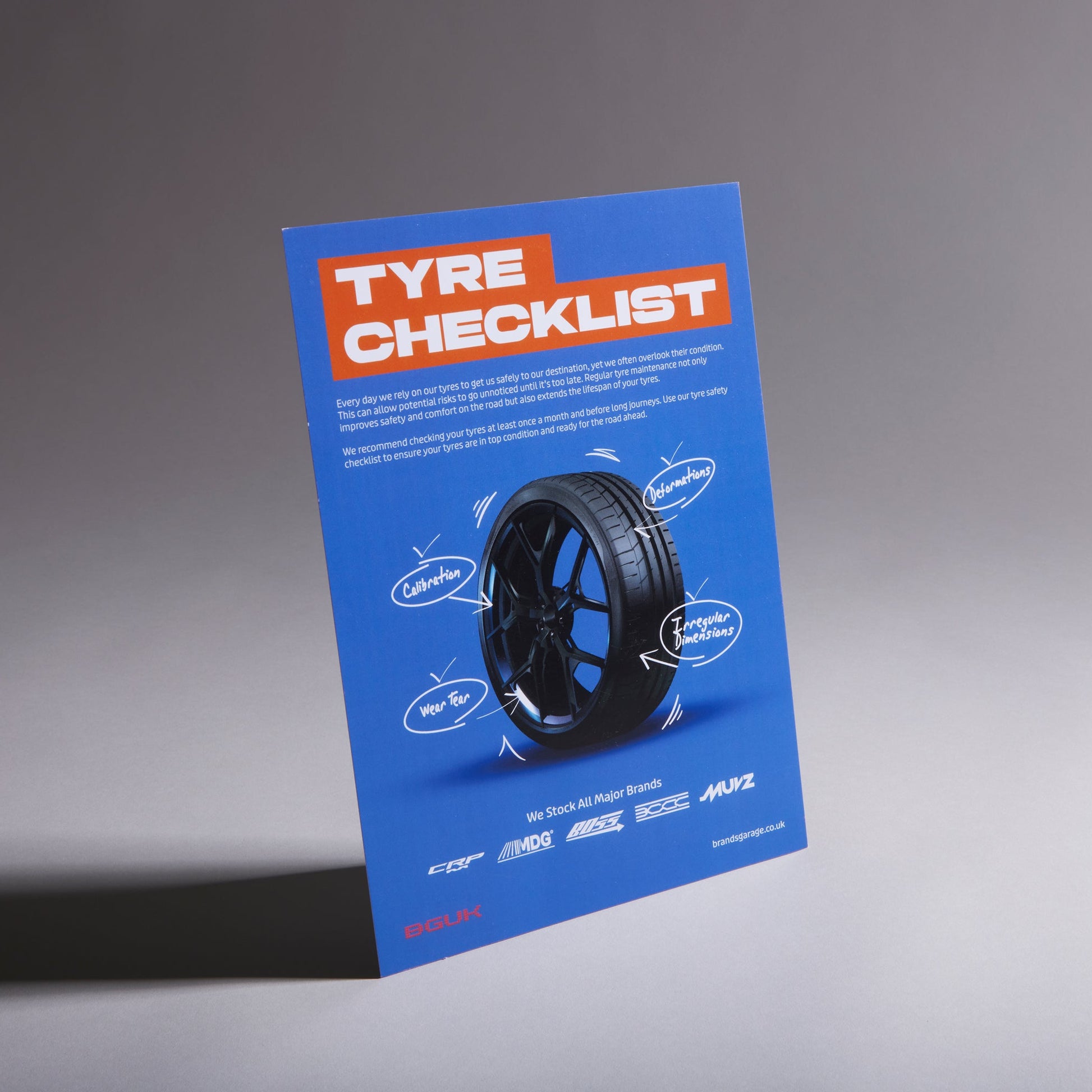 Custom strut card displayed on a reception desk