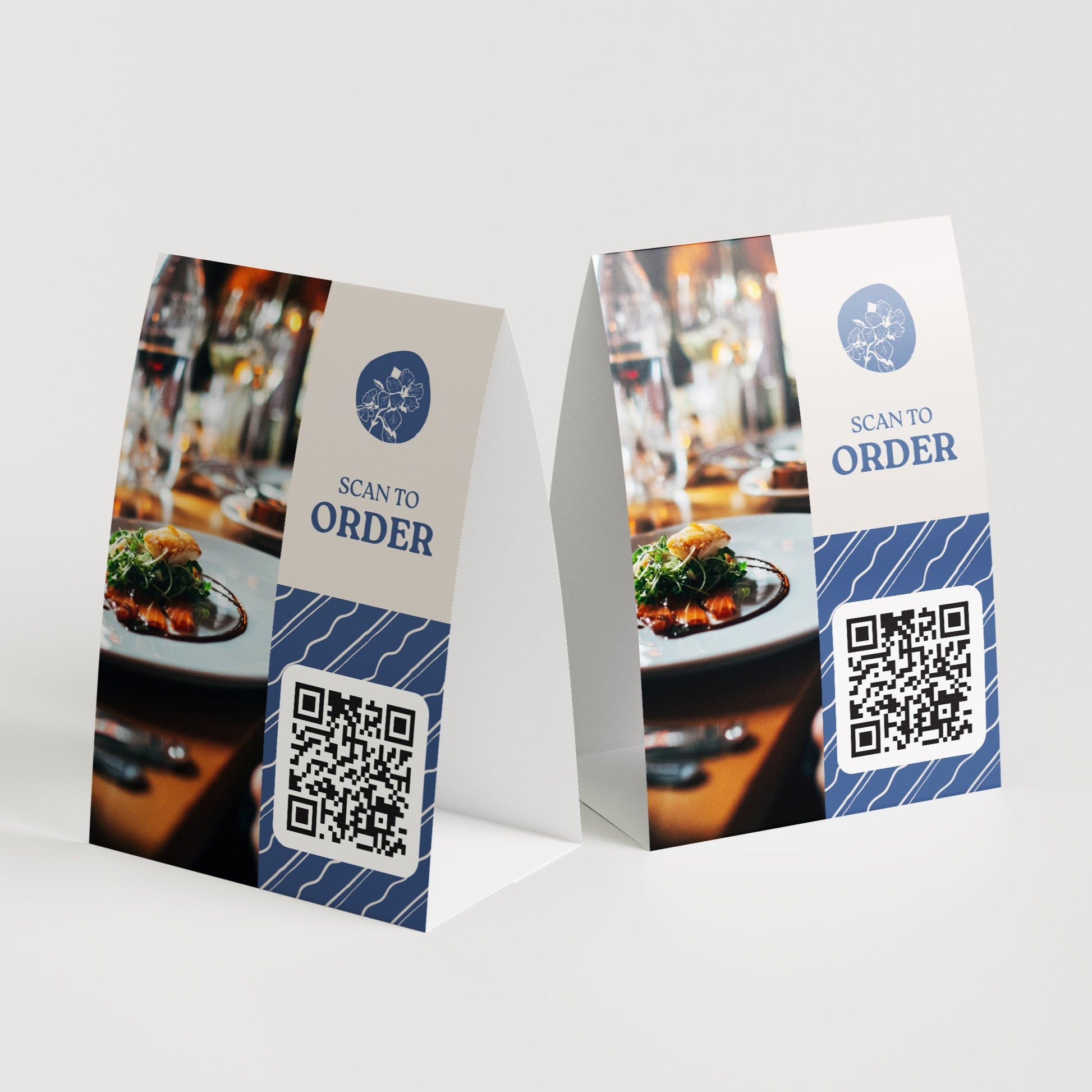 Two table tent signs with QR codes for ordering on a white background