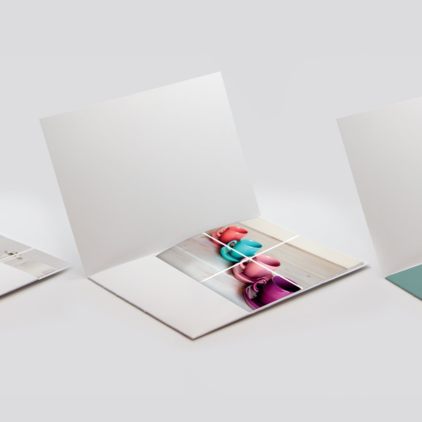 Glued Presentation Folders open and lying on a white background